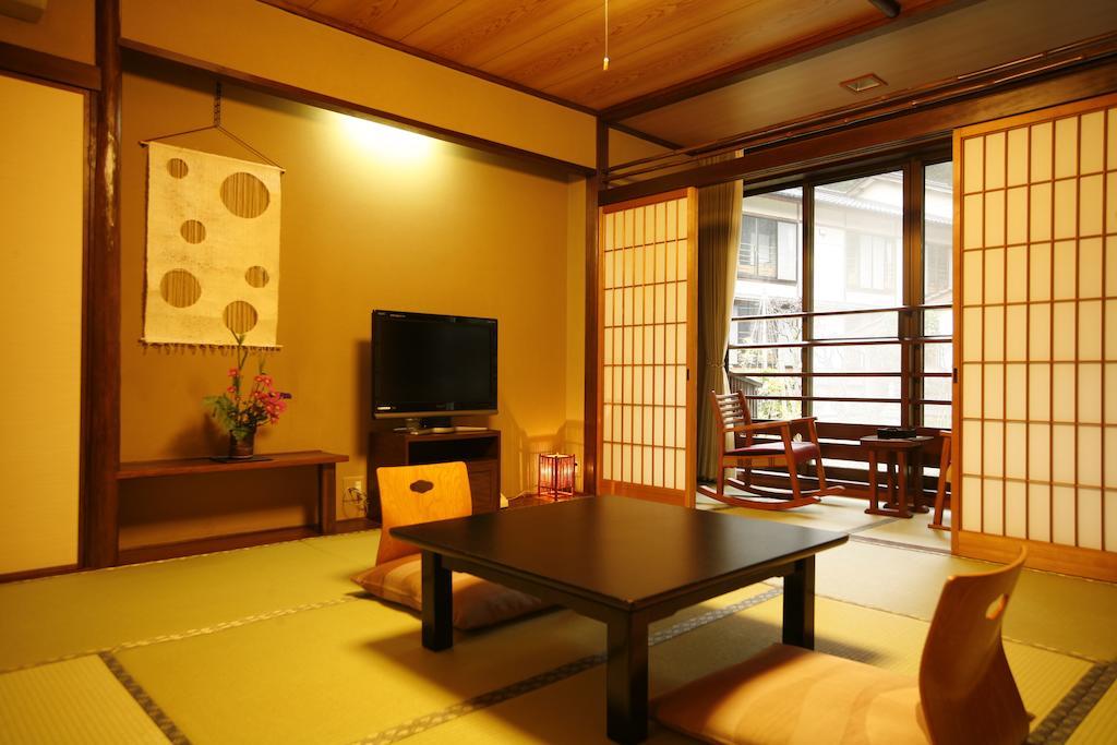 טויוקה Yuraku Kinosaki Spa & Gardens חדר תמונה